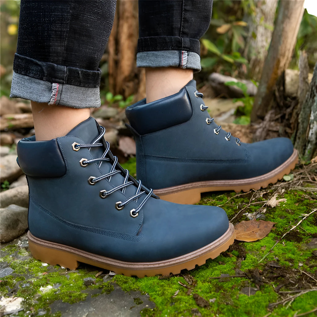 Men's pink high-top Martin boots with velvet lining, round toe, and front lace-up closure on a flat sole.