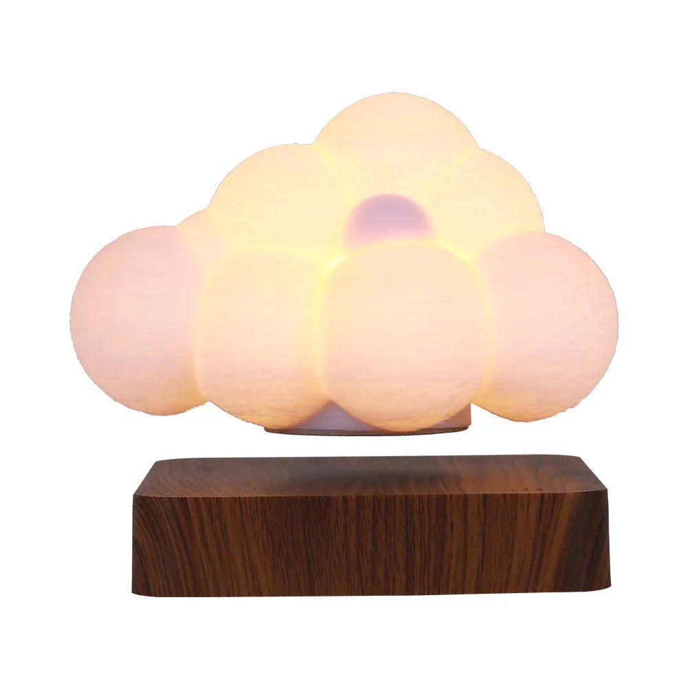 Magnetic levitation cloud night light with 3D printed cloud floating above base, warm white light