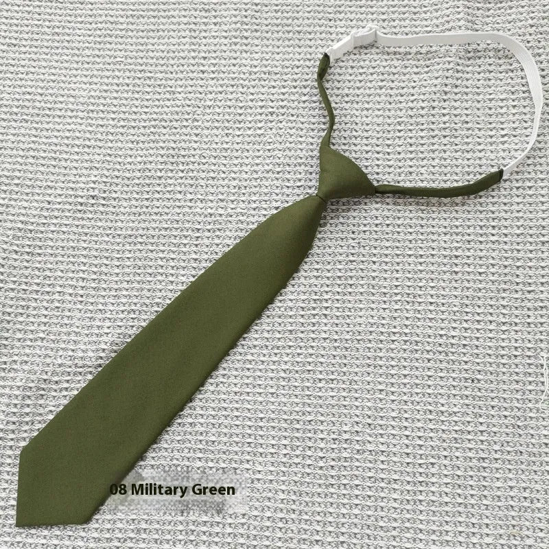 Men's navy blue cotton bow tie with arrow style on a plain background.