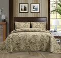 Blue American floral quilted cotton bedspread set on a bed, showing the three-piece 230x250 cm cover.