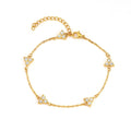 Women's stainless steel geometric bracelet with triangle details and a coloured stone setting.
