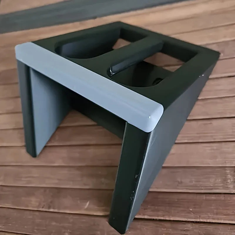 Black punk-style plastic pistol stand for firearm storage and display