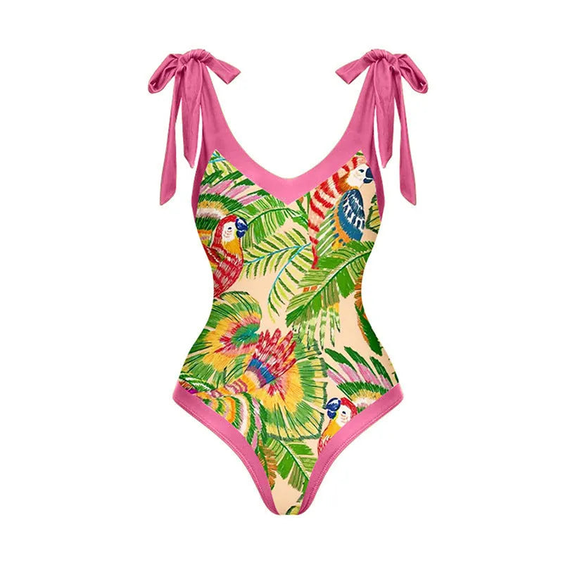Pink floral print women's V-neck one-piece swimsuit with an attached skirt cover