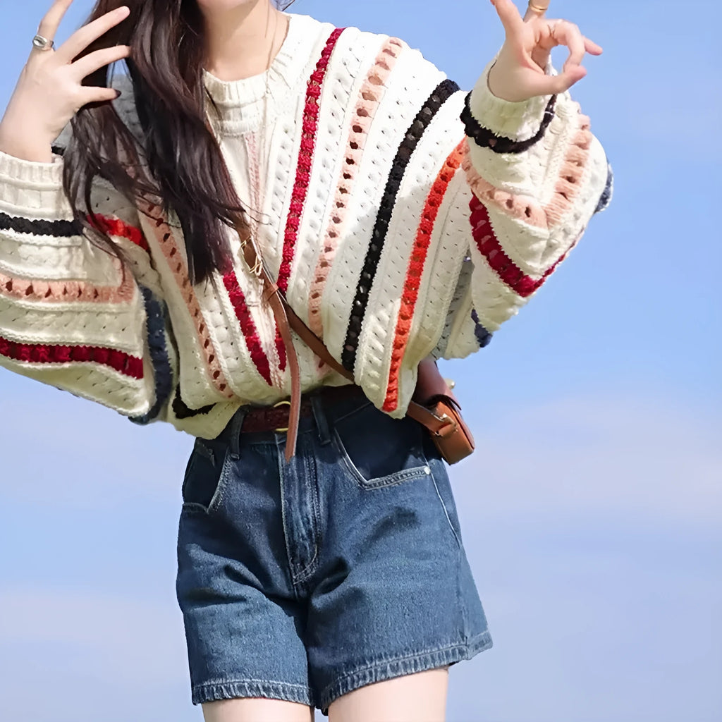 Rainbow striped hollow knit jumper with batwing sleeves and round neck
