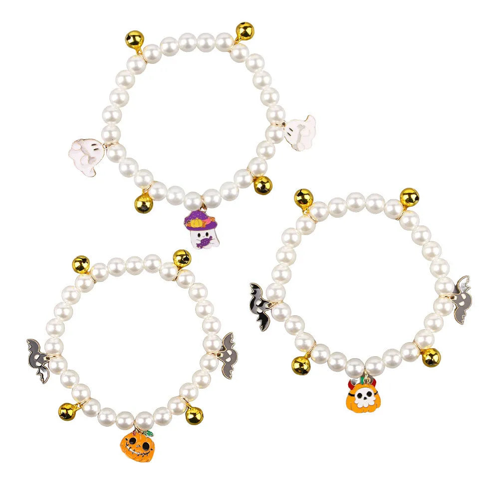 Halloween cat collar with simulated pearl decoration showing purple ghost, skull pumpkin, and smiling pumpkin design options