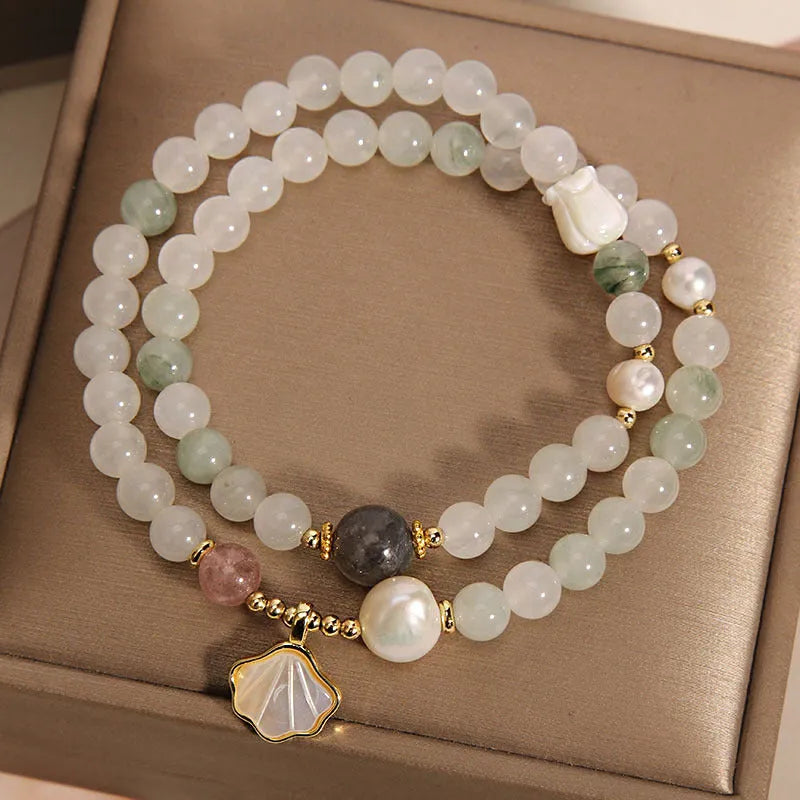 Tianshan emerald green crystal bracelet with gold-plated ginkgo leaf pendant and rhinestone details