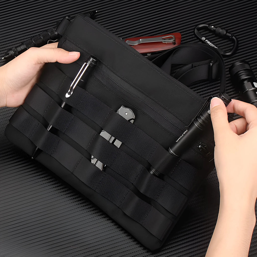 Black Oxford cloth portable outdoor kit measuring 18 by 3.5 centimetres