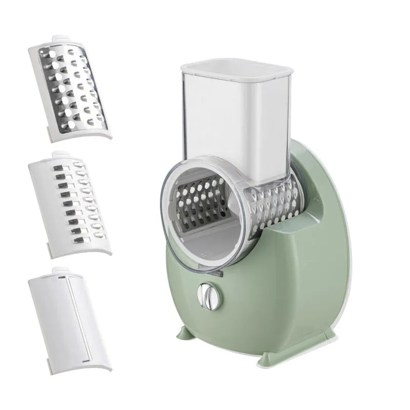 White and green electric vegetable slicer with suction base, feeding port, and multiple blades.