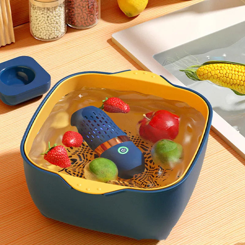 Blue capsule fruit and vegetable purifier with mechanical button and USB charging, placed in water