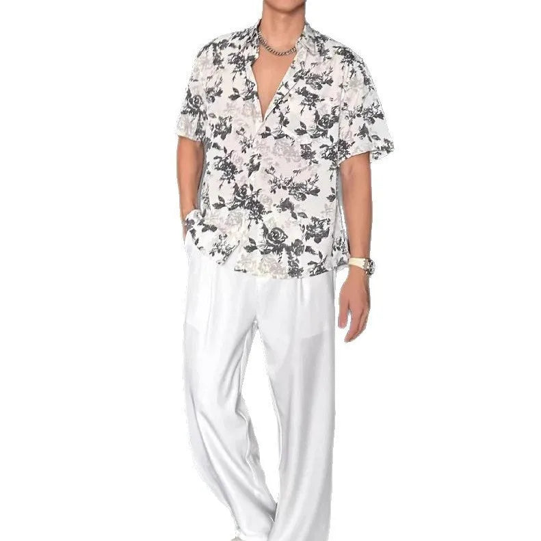 Short sleeve floral print shirt in black or white with loose casual fit