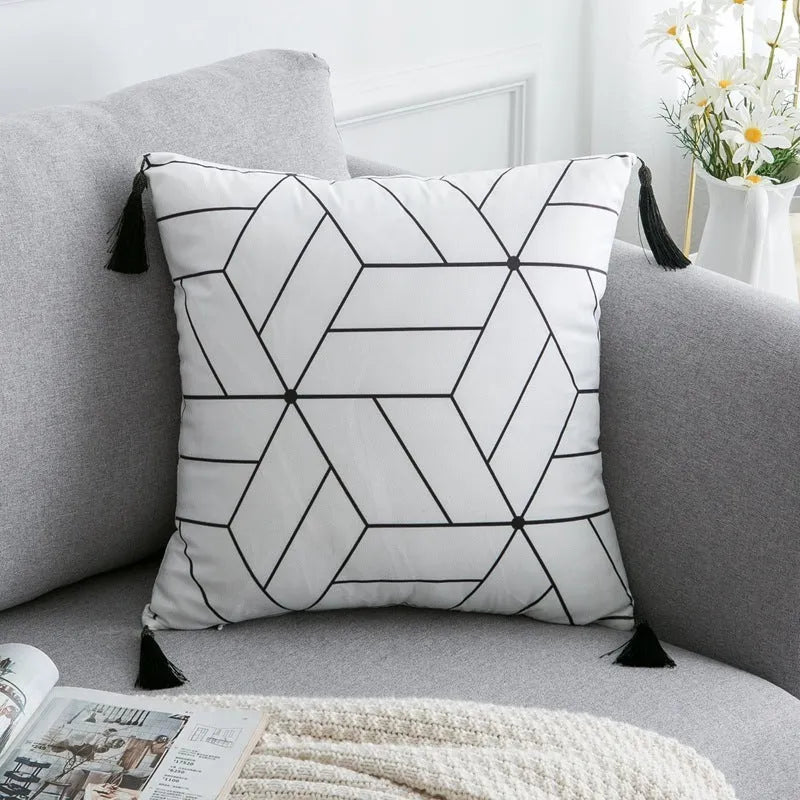 Bohemian style throw pillow on a sofa, available in light grey, black, or white, shown in 45x45cm size.