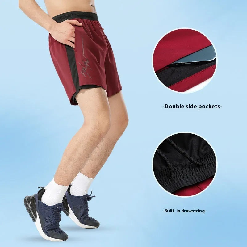 Men's solid colour polyester basketball shorts in low waist design on a neutral background