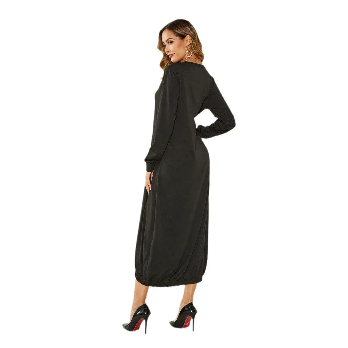 Black knitted lantern dress with loose fit sleeves and lace-up front detail on a mannequin.
