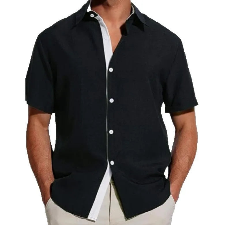Man wearing a short sleeve floral print shirt in cardigan style, suitable for summer.