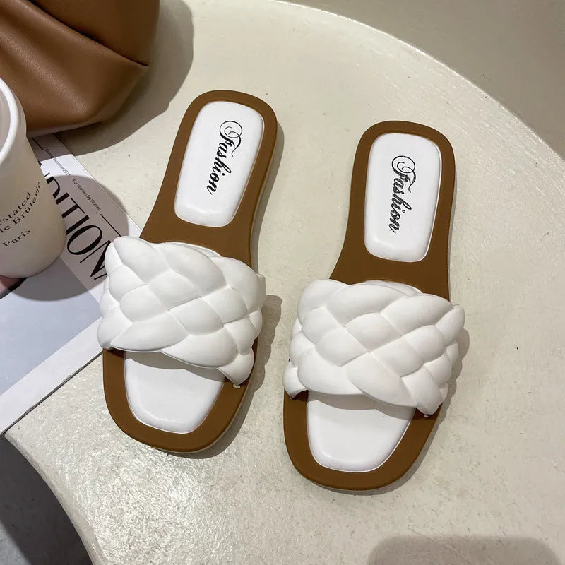 Women's plaid PVC beach sandals with thick anti-skid soles in black, green, orange and white.