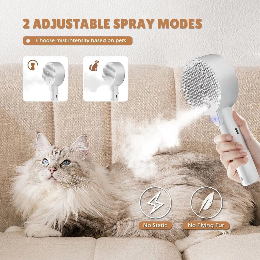 Pink and white cat steam brush with transparent water tank and rounded comb head
