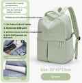 Nylon travel computer backpack with vertical square shape, zipper closure, and double-joint shoulder straps in green on white background