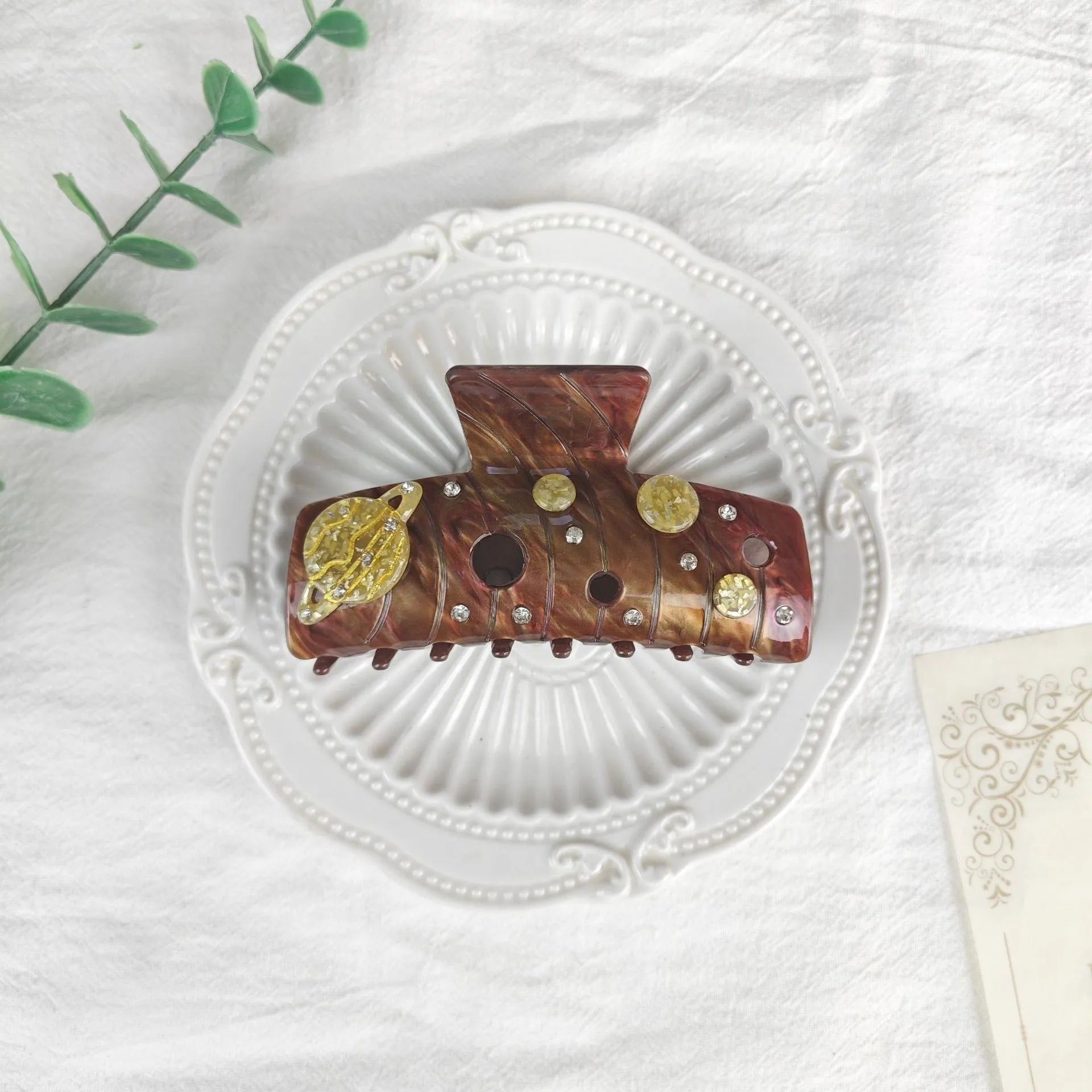 Oversized women's hair barrette with a starry sky pattern in sky blue.
