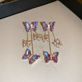 Silver needle blue purple butterfly crystal flower tassel earrings with electroplated alloy construction