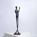 Black cast aluminium reading woman desktop sculpture modern design 51cm tall