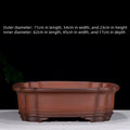 Antique finish Chinese style purple clay rectangular flowerpot measuring 71cm long, 54cm wide, and 23cm high.