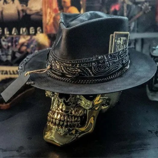 Handmade wool felt Halloween hat with conical crown and skull print, featuring denim fabric accents