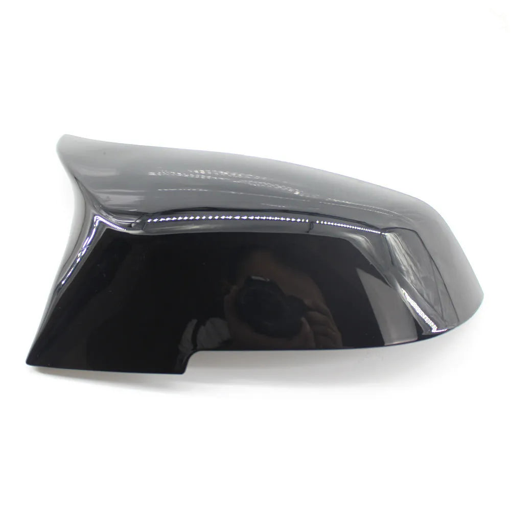 Paint bright black replacement rear-view mirror shell for BMW 3 Series and 4 Series F-model vehicles.