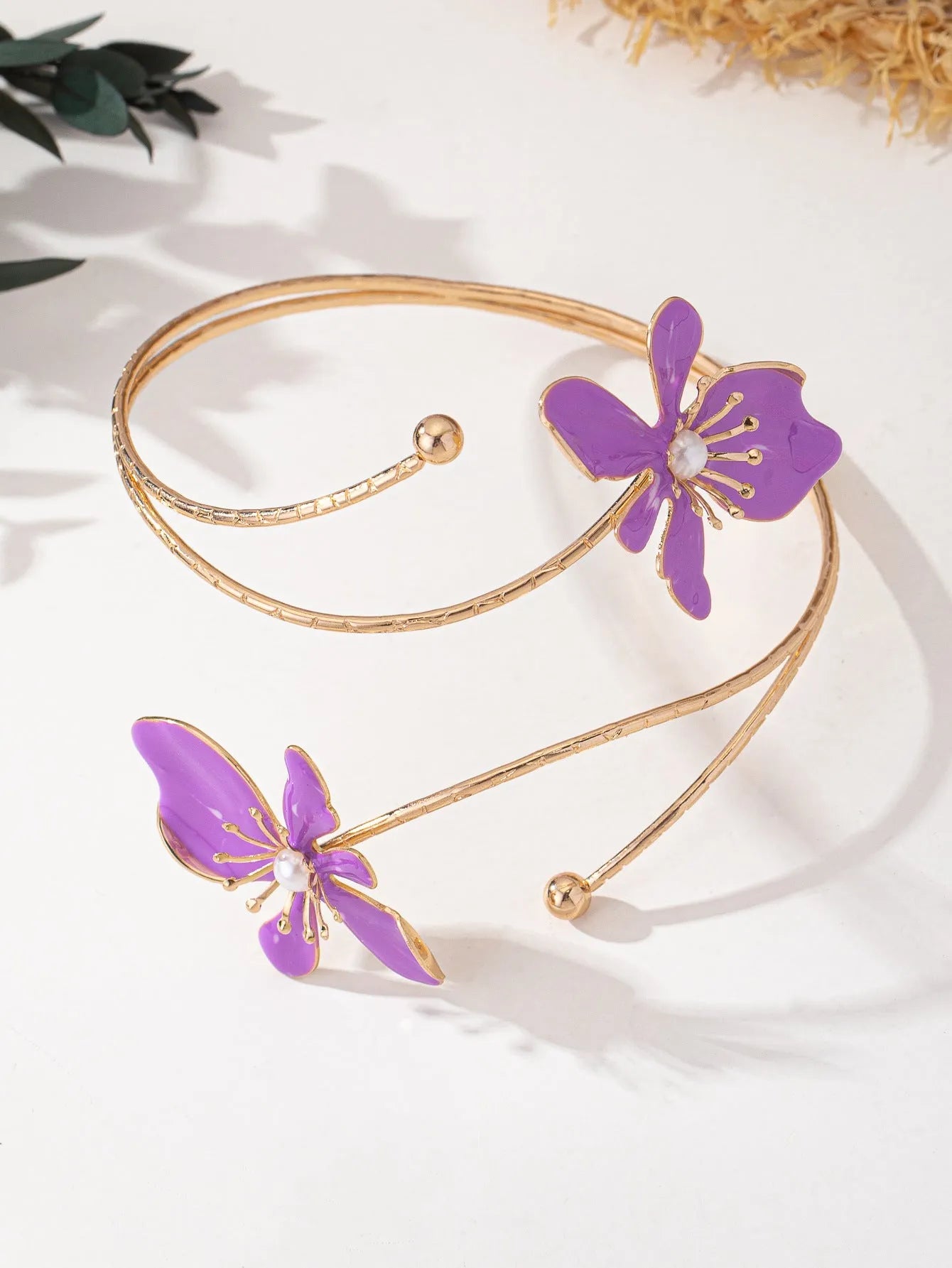 Adjustable alloy armband with hollow pattern design in pink or purple colour