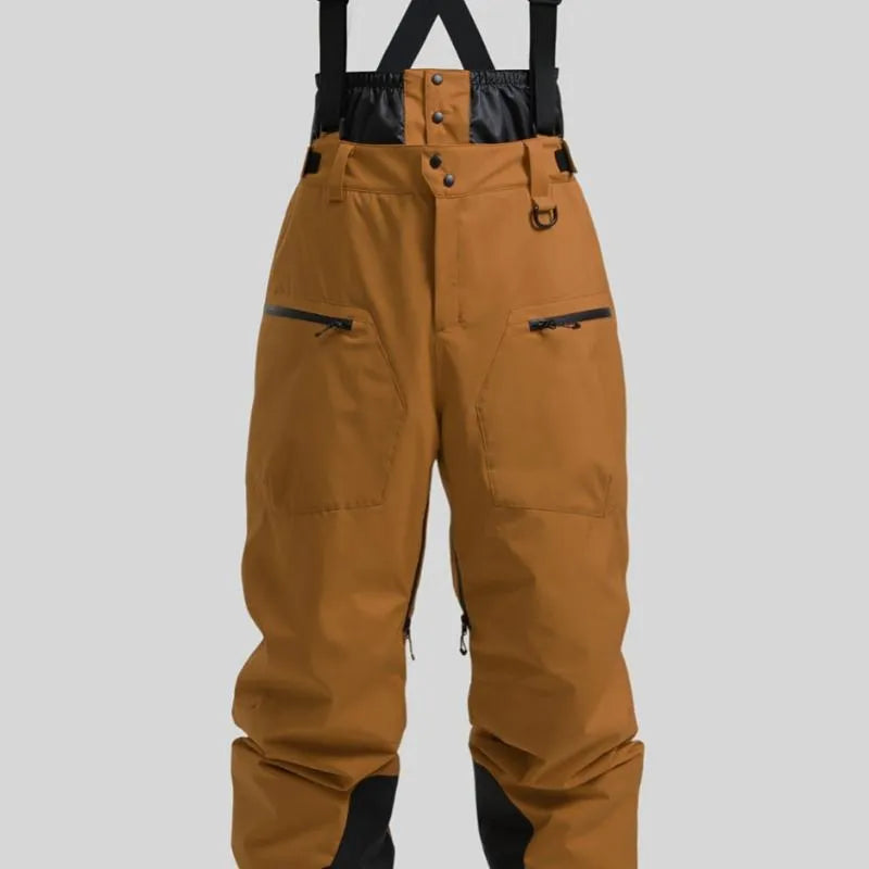 Men's black waterproof ski trousers with adjustable ankle straps on a model