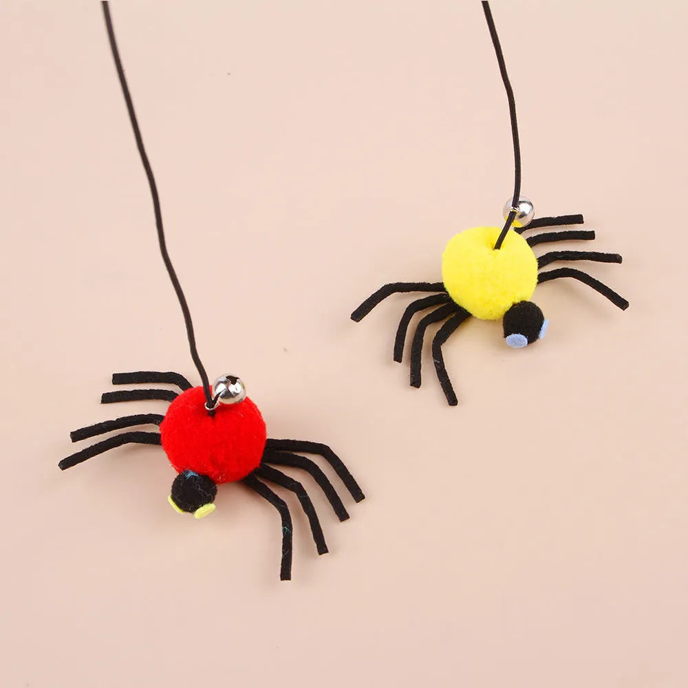 Cat hanging door toy with elastic rope, feather stick, bell, and spider decoration in red or yellow colours