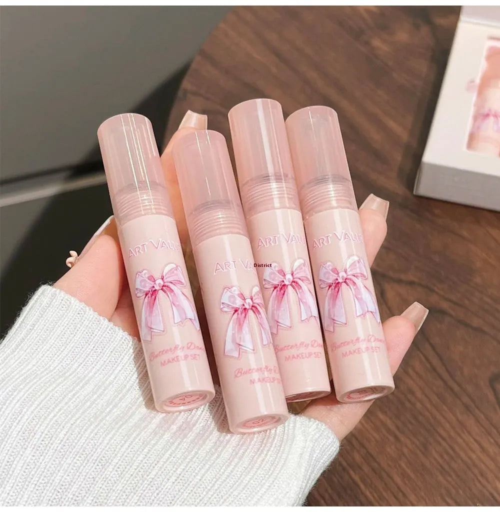 Butterfly Box makeup set with pink cosmetics and necklace