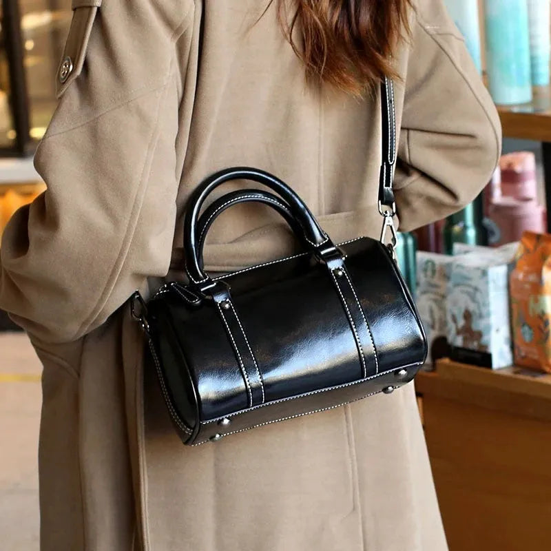 Cortex Lady casual zip crossbody bag in top grain leather, cylindrical shape, patchwork, available in caramel colour