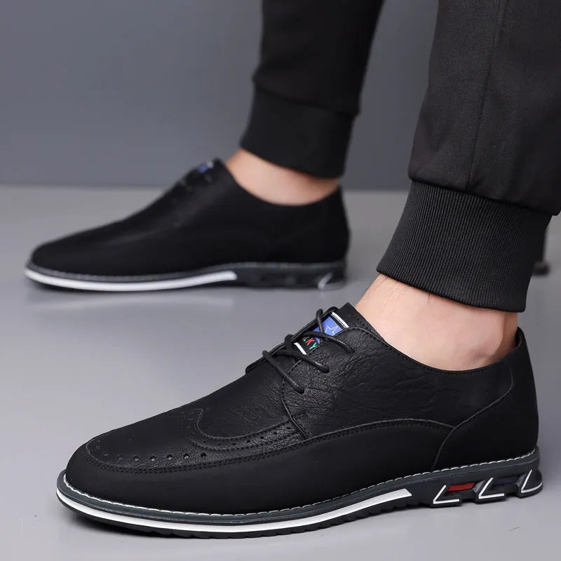 Men's casual low-top leather shoes with a fabric upper, leather toe cap, and rubber sole.