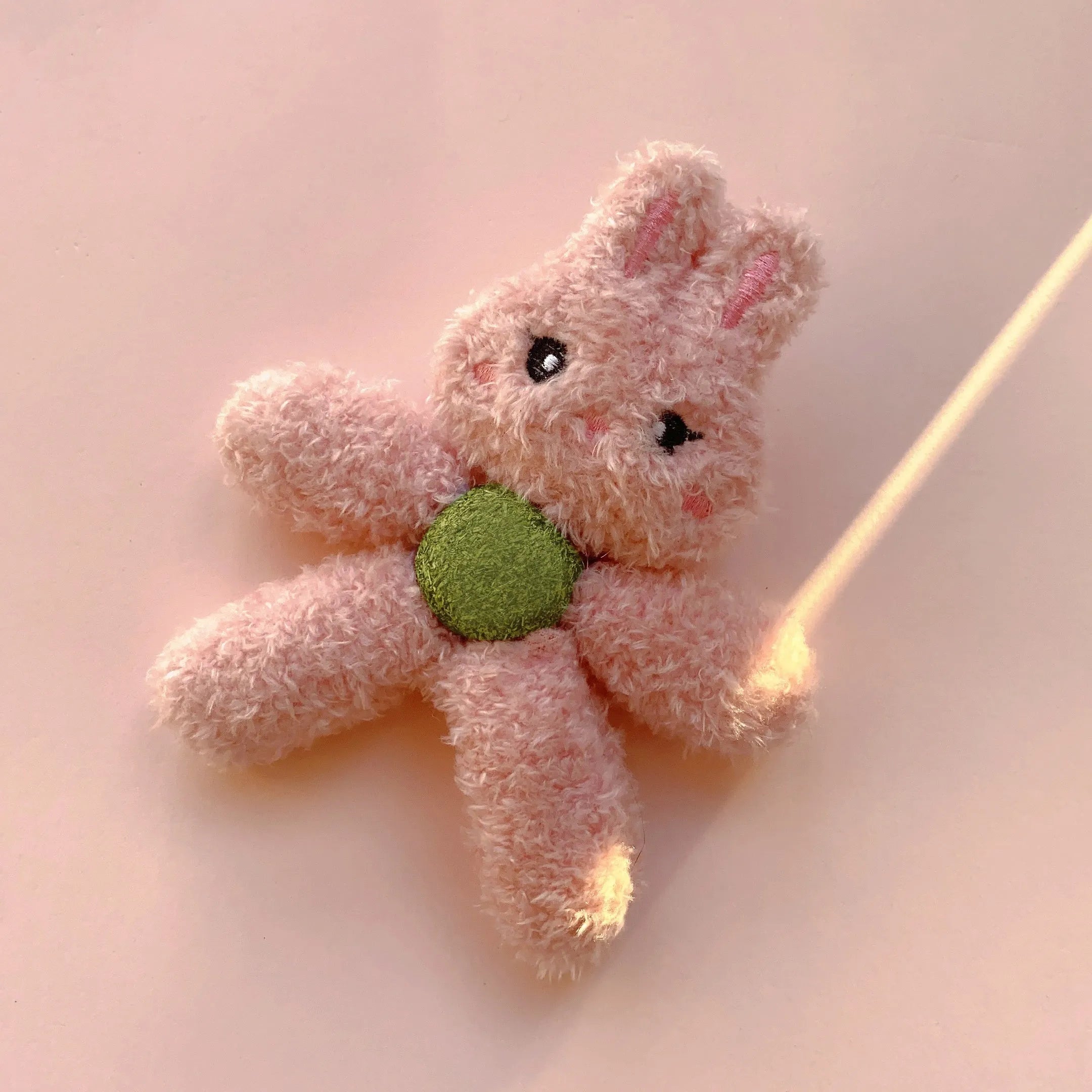 Edible catnip ball chewing toy for cats in animal designs, 12.5cm tall with cat grass filling