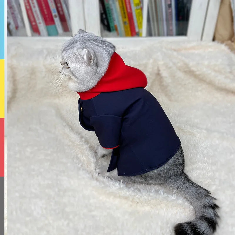 Tiger Staff Yuren patterned hoodie garment on a cat or dog for photography.
