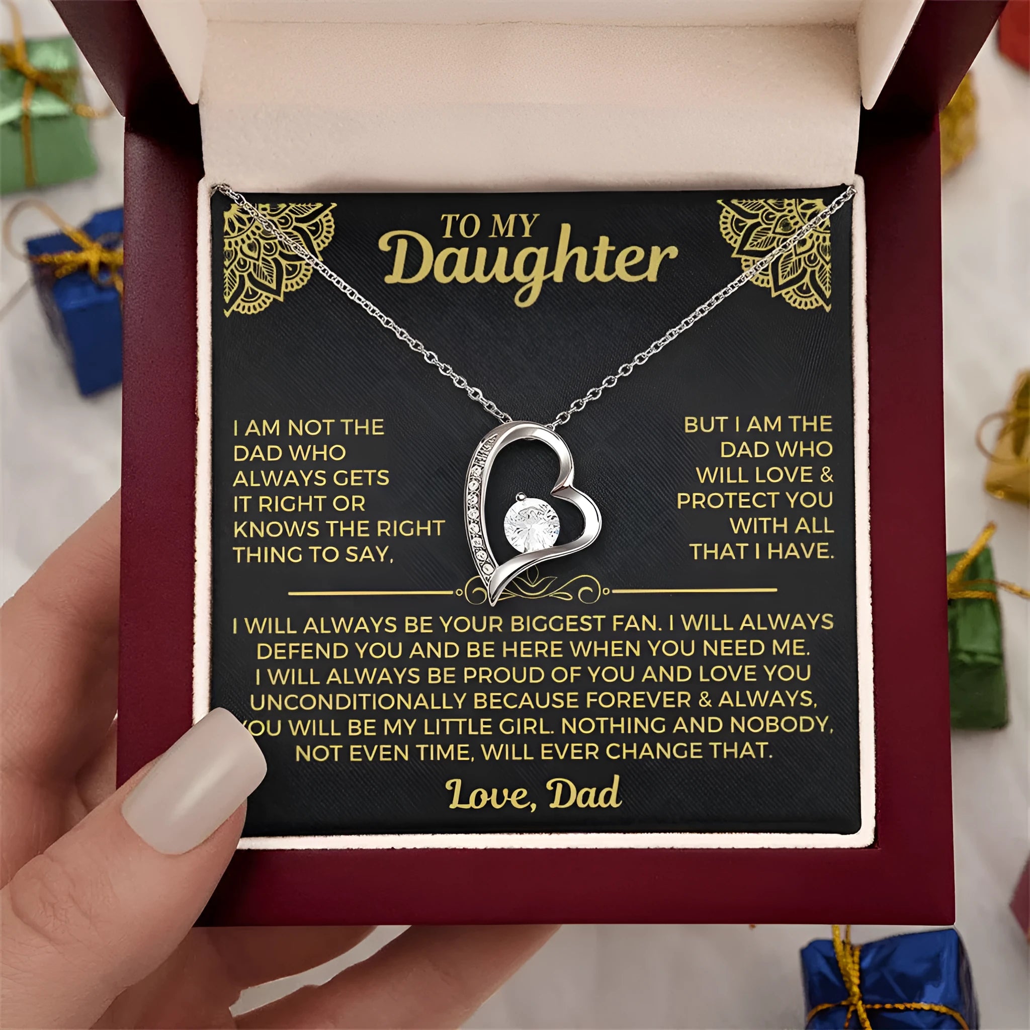 Hollow heart-shaped pendant necklace in gold or silver finish with gift box and card.