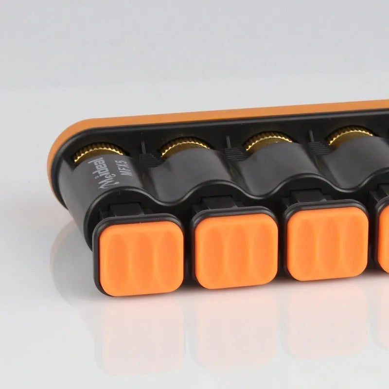 Grey and orange silicone finger trainer for hand muscle development.