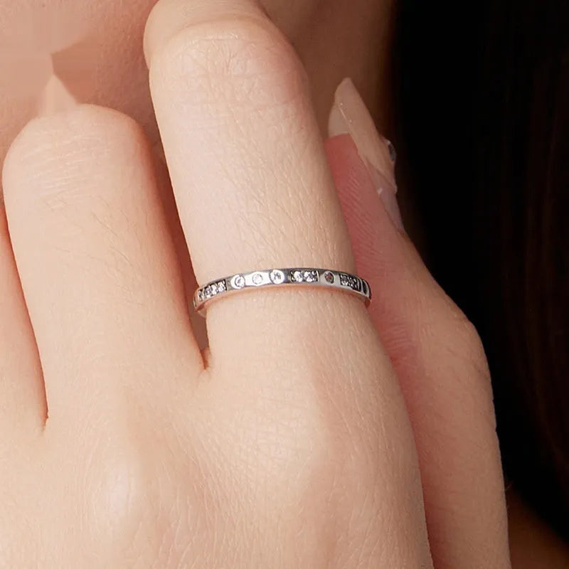 Silver alloy women's ring bracelet with oxidised black finish and I Love You design, shown in size 7.