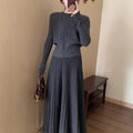 Dark grey artistic retro knitted dress suit set with sweater, skirt, and 3D pattern detail.