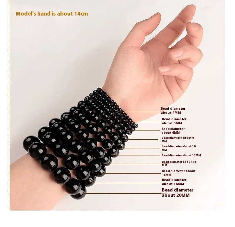 Natural Smokey Violet Hetian Jade straight cut bracelet with 8x9mm beads on a wrist.