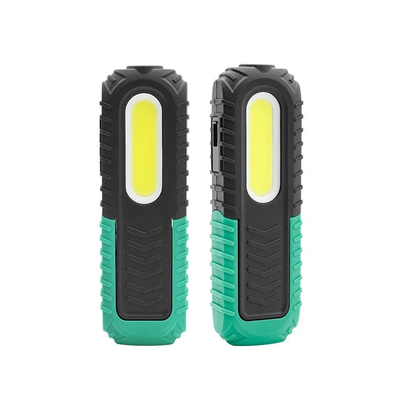 Black and green auto repair work light with USB charging port and clear lens