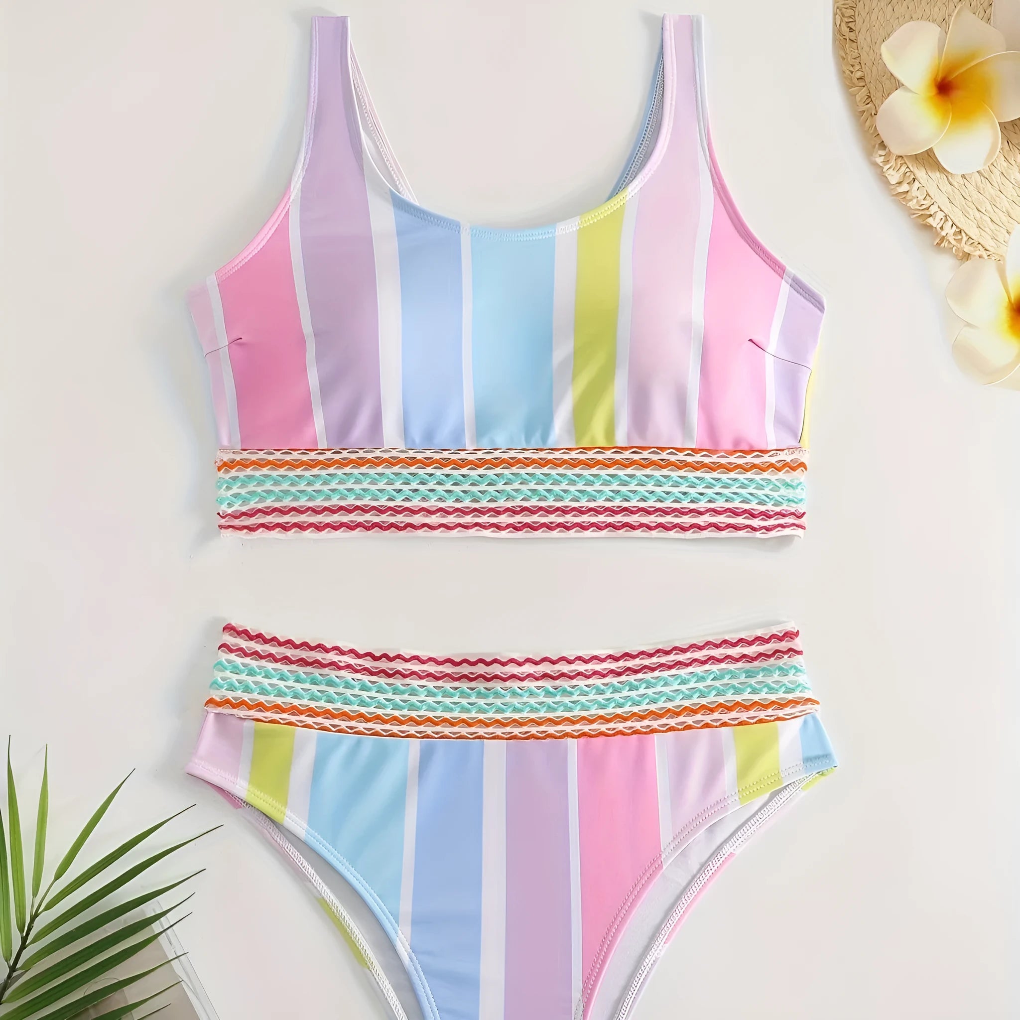 Women's striped bikini swimwear set with top and briefs for swimming sports.