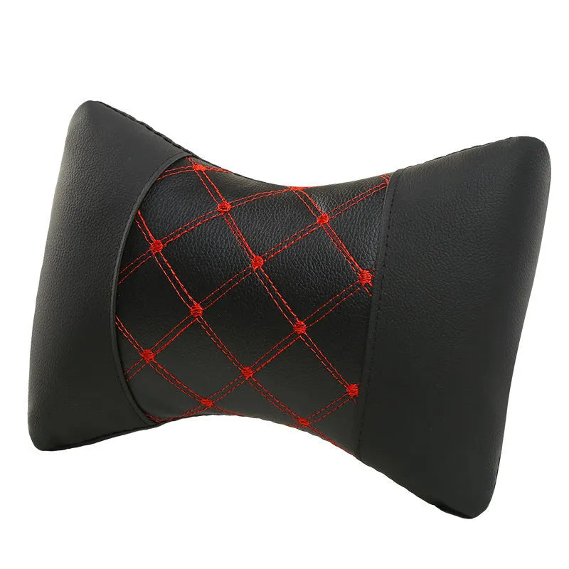 Quilted diamond-pattern black leather car headrest pillow for neck support.