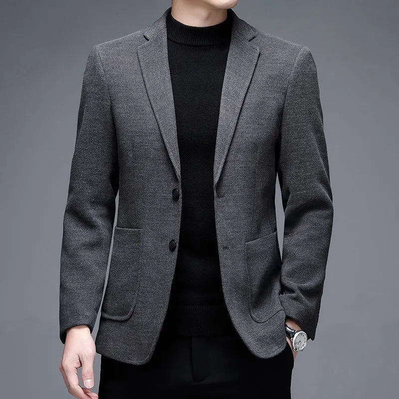 Men's solid colour loose fit winter jacket in grey, shown with long sleeves and round hem.