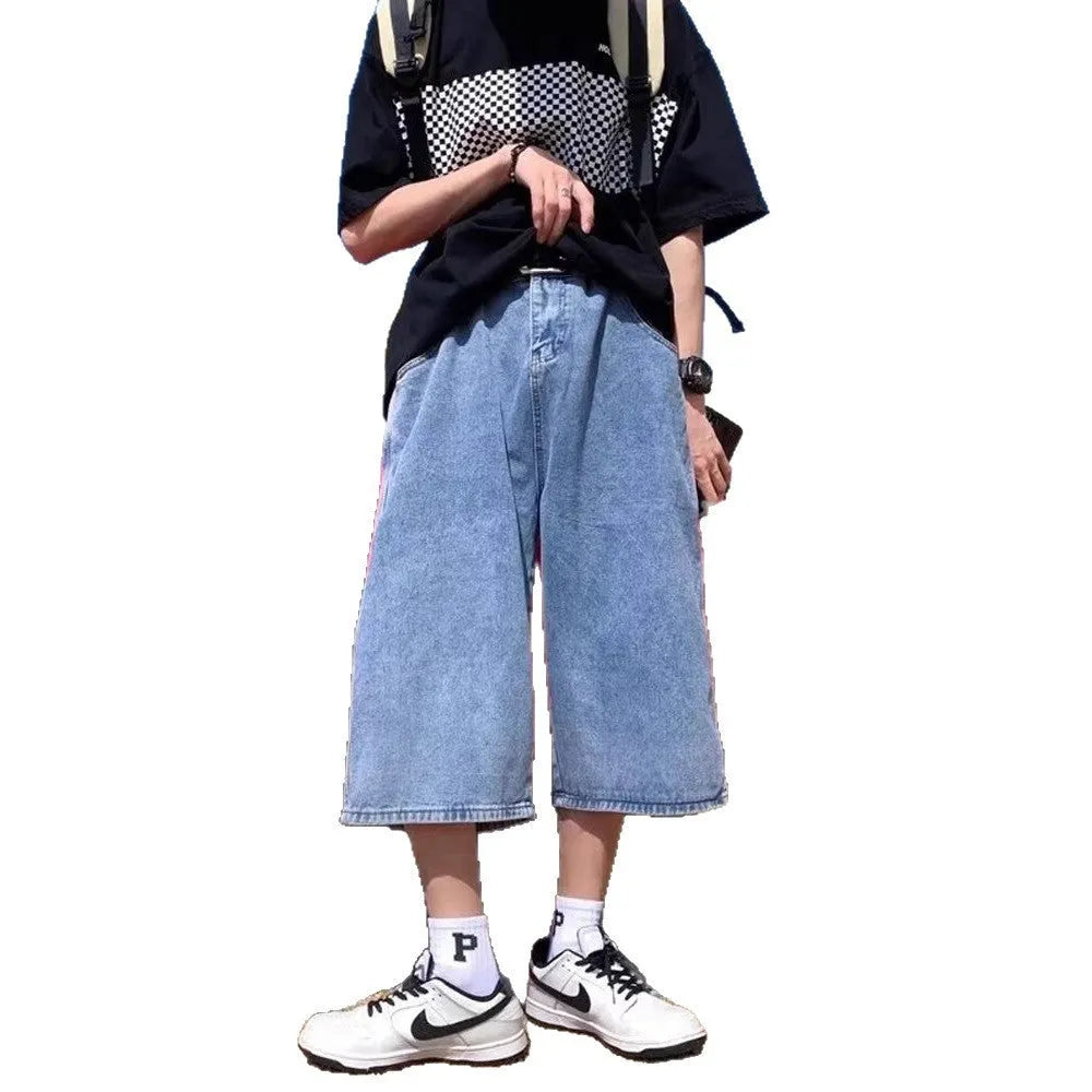 Men's blue washed denim pirate shorts with a high waist and cropped, straight leg.