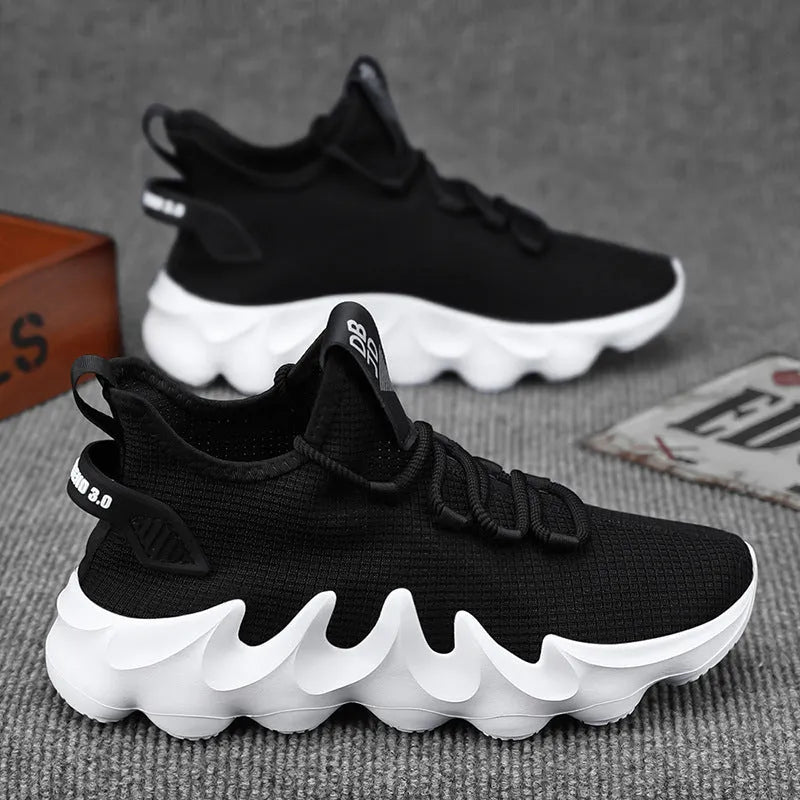 Men's black sock-like low-top lace-up shoes with round toe and flat rubber sole on white background
