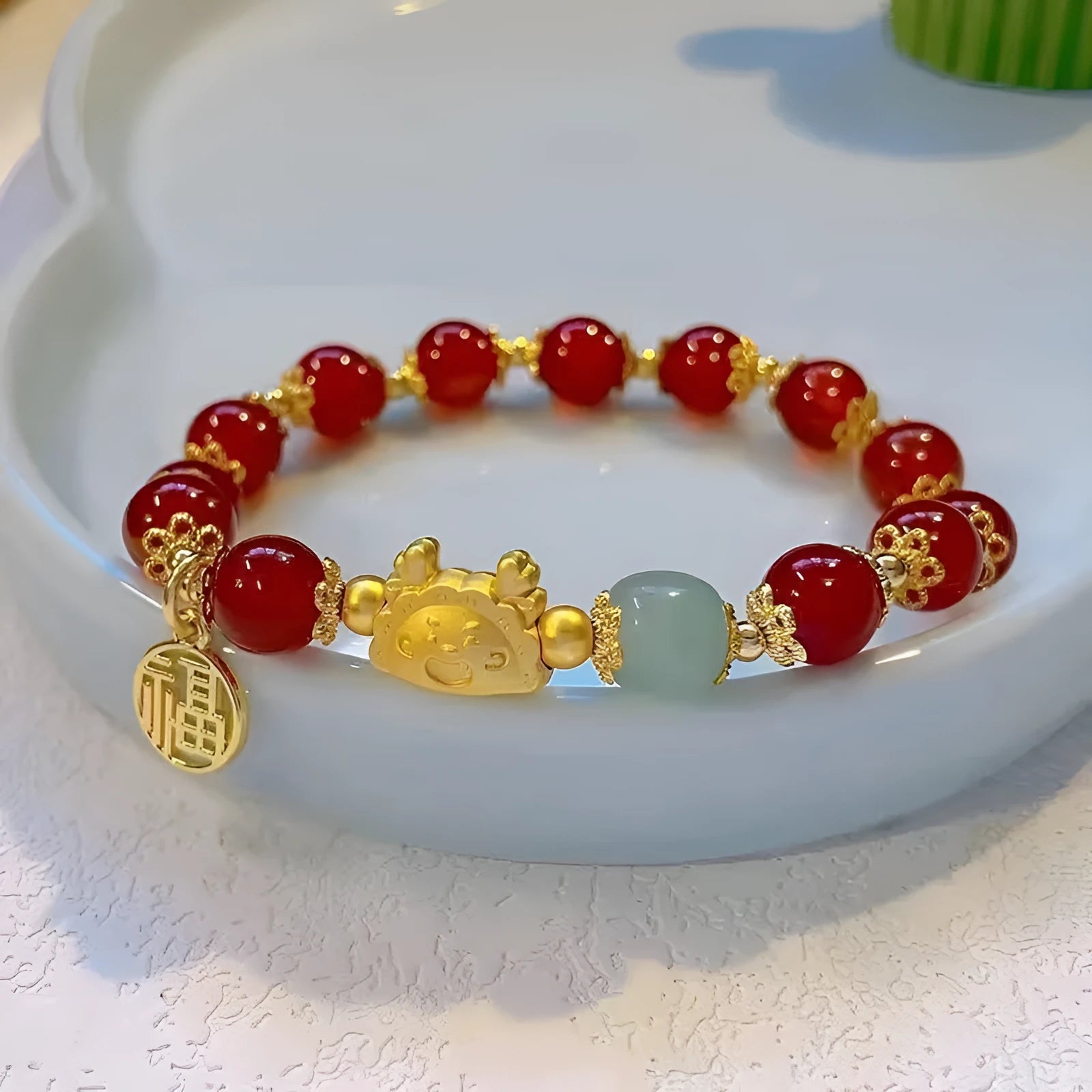 Glass floral bracelet with ice crack pattern and zodiac modelling in red, pink, or white bead options