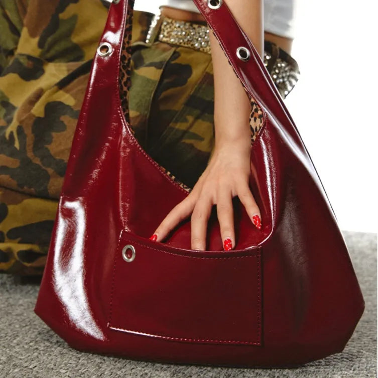 Red leopard print women's shoulder bag showing two-side large capacity and dumpling shape