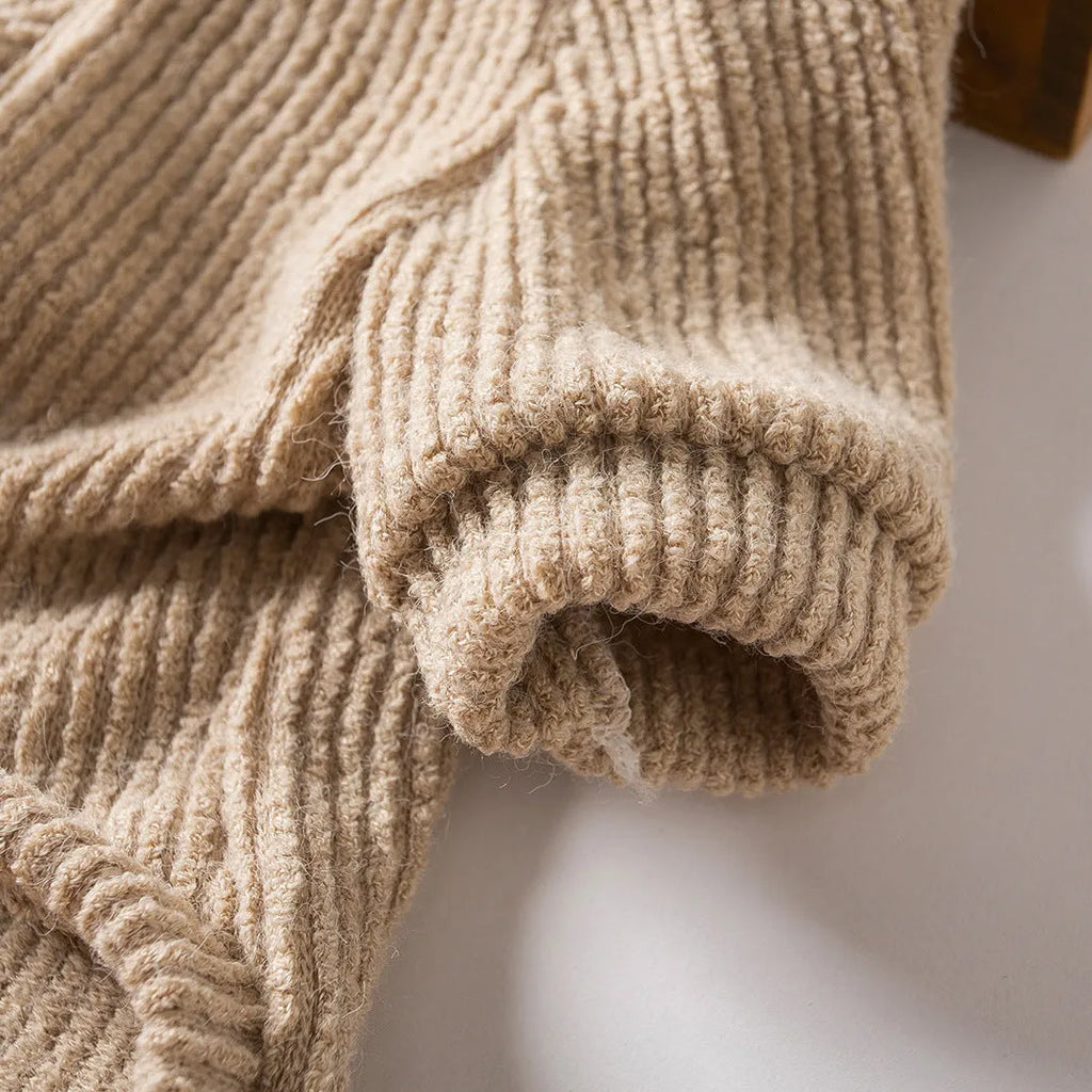 Brown cloth pullover sweater on a small dog, showing casual style and fit for breeds like Bichon or Pomeranian.