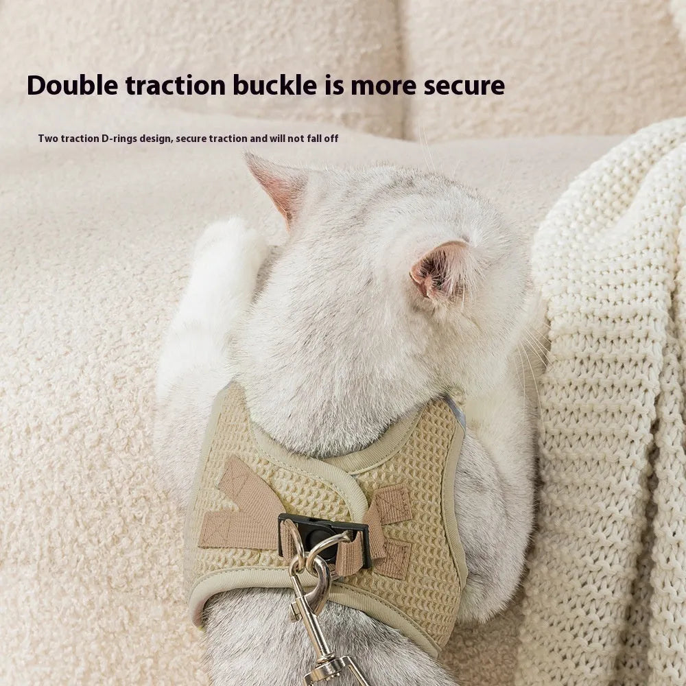 Brown waffle pattern cloth cat harness with integrated pulling rope shown on size M